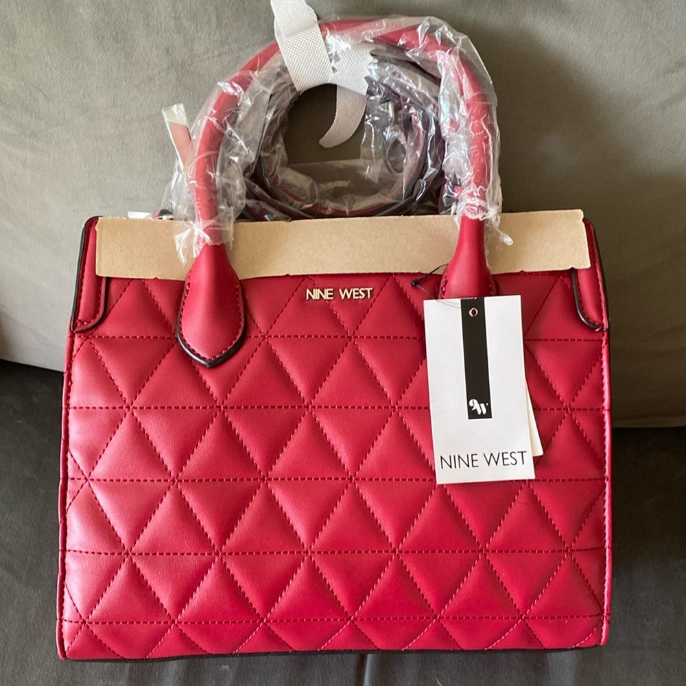 Brand new, cherry red purse.